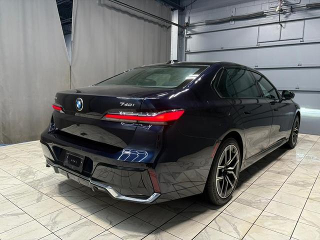 Photo of 2024 Frozen Tanzanite Blue Metallic BMW 740