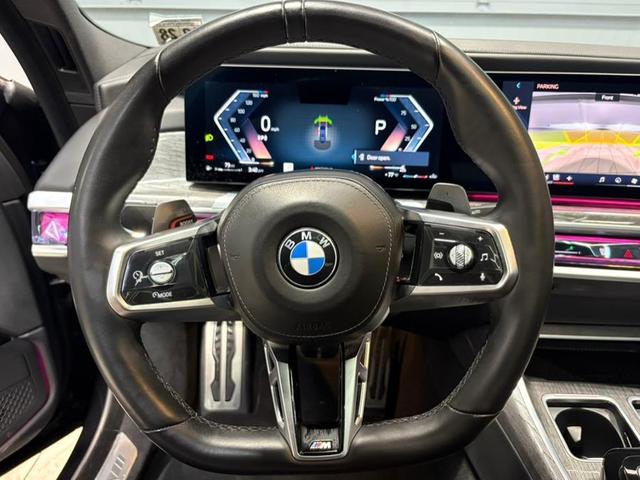Photo of 2024 Frozen Tanzanite Blue Metallic BMW 740