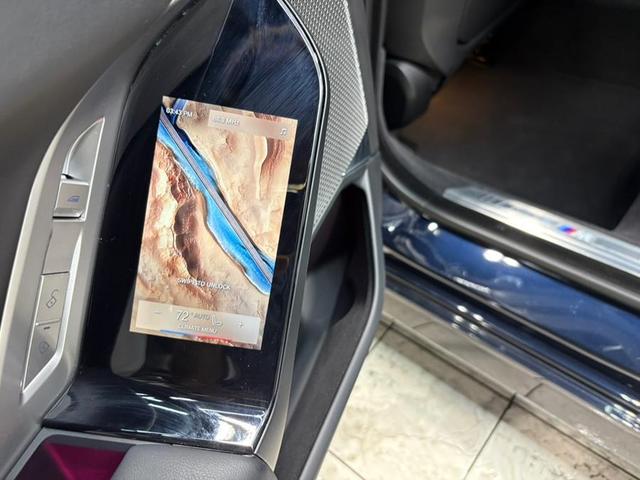 Photo of 2024 Frozen Tanzanite Blue Metallic BMW 740