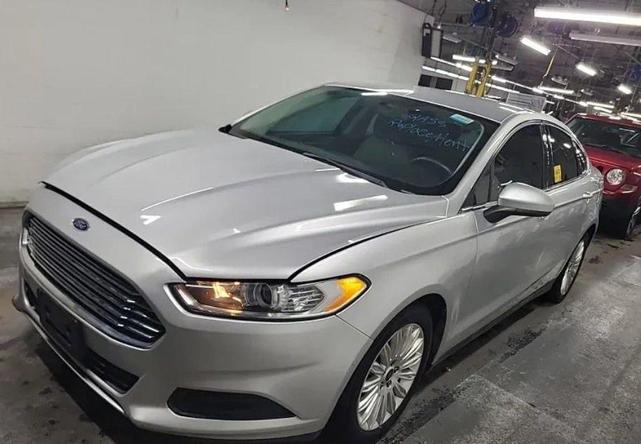 Photo of 2016 Ingot Silver Ford Fusion Hybrid
