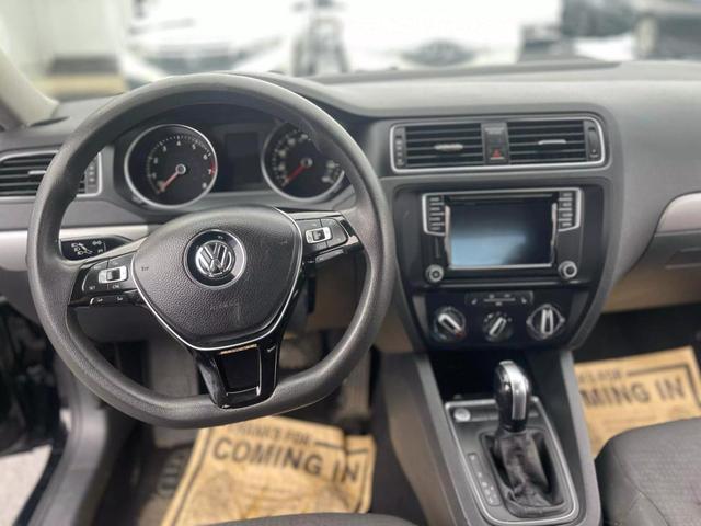Photo of 2016 Black Uni Volkswagen Jetta