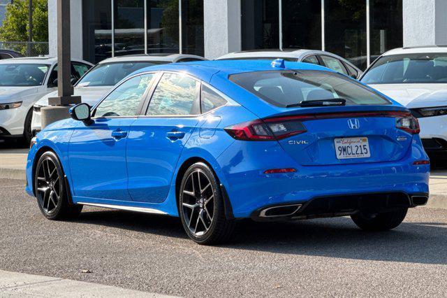Photo of 2022 Boost Blue Pearl Honda Civic