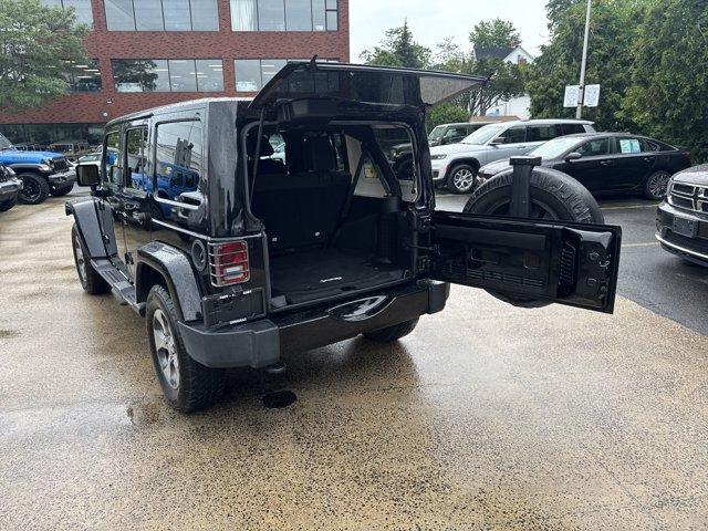 Photo of 2016 Black Clearcoat Jeep Wrangler Unlimited