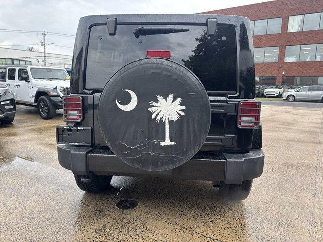 Photo of 2016 Black Clearcoat Jeep Wrangler Unlimited