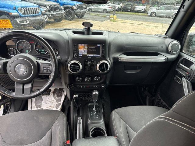 Photo of 2016 Black Clearcoat Jeep Wrangler Unlimited