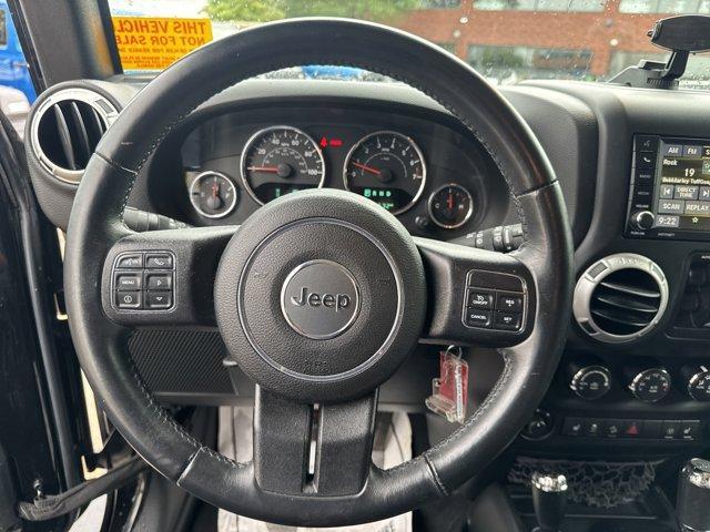 Photo of 2016 Black Clearcoat Jeep Wrangler Unlimited