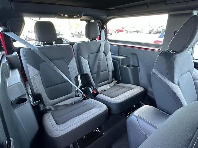 Photo of 2025 Ruby Red Metallic Tinted Clearcoat Ford Bronco
