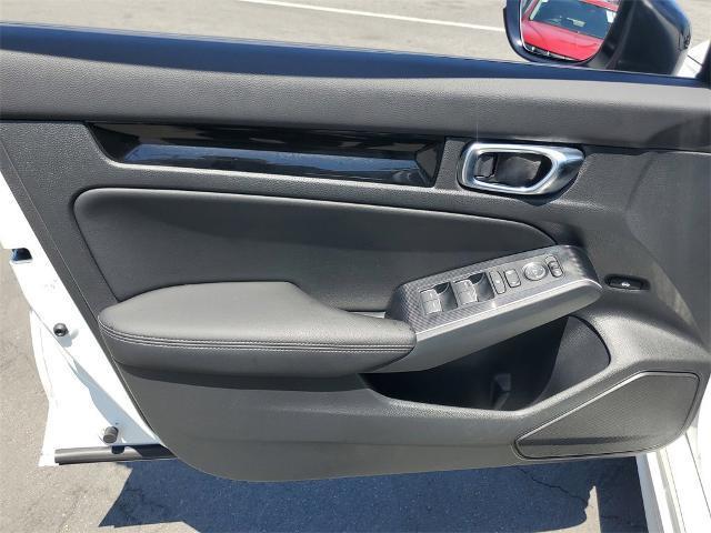 Photo of 2025 Platinum White Pearl Honda Civic Hybrid