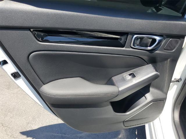 Photo of 2025 Platinum White Pearl Honda Civic Hybrid