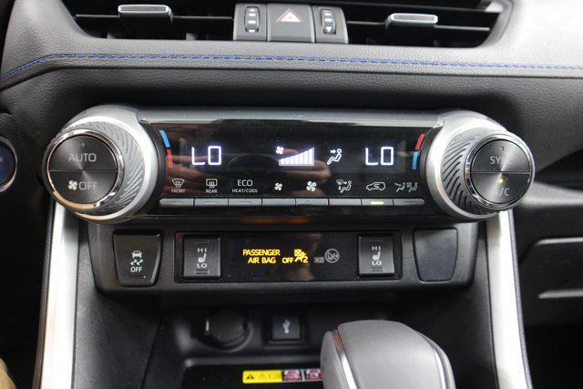 Photo of 2022 Blizzard Pearl/Midnight Black Metallic Toyota RAV4 Hybrid