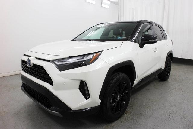 Photo of 2022 Blizzard Pearl/Midnight Black Metallic Toyota RAV4 Hybrid
