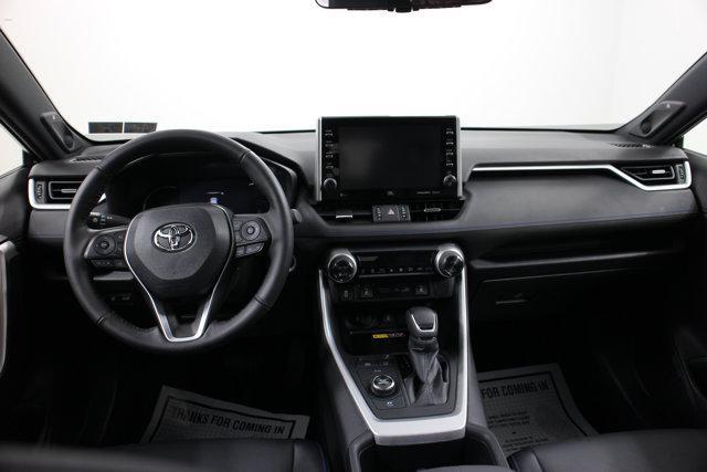 Photo of 2022 Blizzard Pearl/Midnight Black Metallic Toyota RAV4 Hybrid