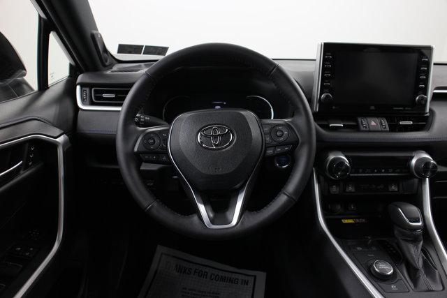 Photo of 2022 Blizzard Pearl/Midnight Black Metallic Toyota RAV4 Hybrid