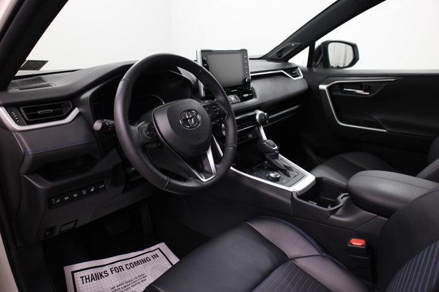 Photo of 2022 Blizzard Pearl/Midnight Black Metallic Toyota RAV4 Hybrid