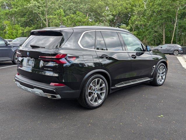Photo of 2024 Black Sapphire Metallic BMW X5 PHEV