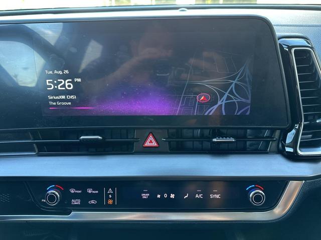 Photo of 2023 Snow White Pearl Kia Sportage Hybrid