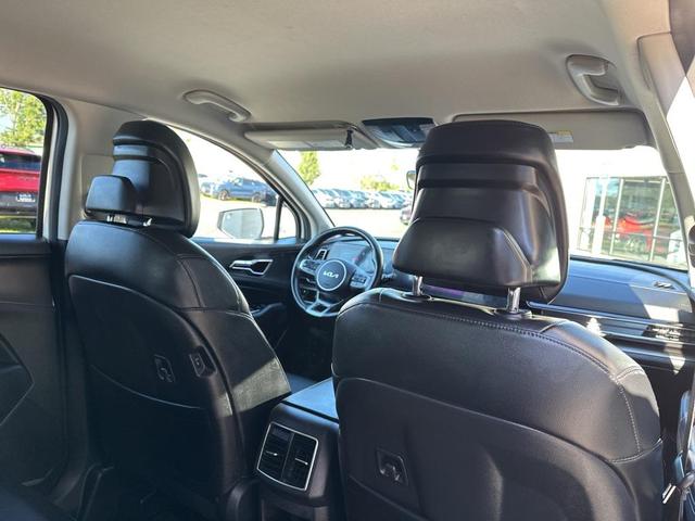 Photo of 2023 Snow White Pearl Kia Sportage Hybrid