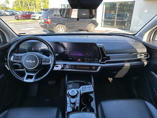 Photo of 2023 Snow White Pearl Kia Sportage Hybrid