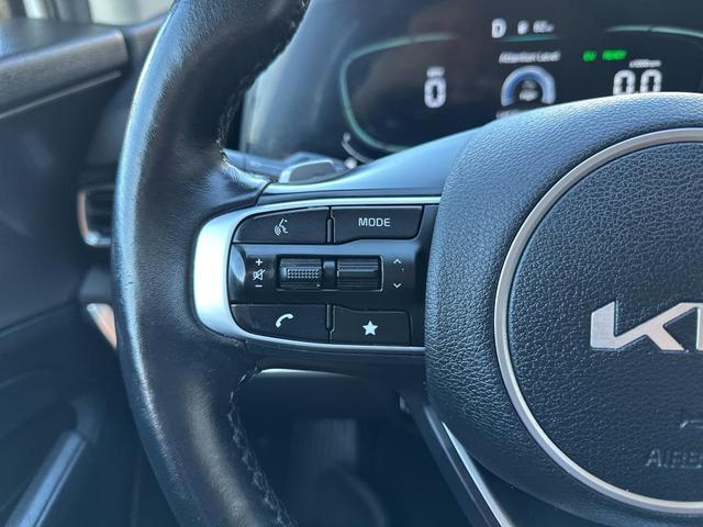 Photo of 2023 Snow White Pearl Kia Sportage Hybrid