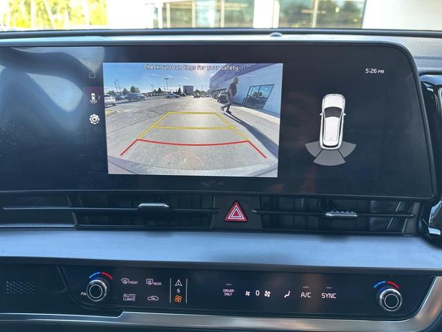 Photo of 2023 Snow White Pearl Kia Sportage Hybrid