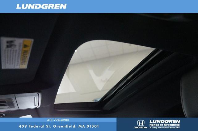 Photo of 2025 Sand Dune Honda Civic Hybrid