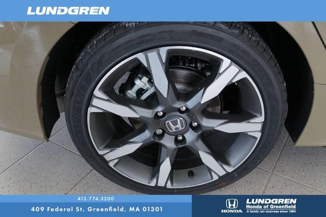 Photo of 2025 Sand Dune Honda Civic Hybrid