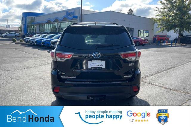Photo of 2016 Midnight Black Metallic Toyota Highlander Hybrid