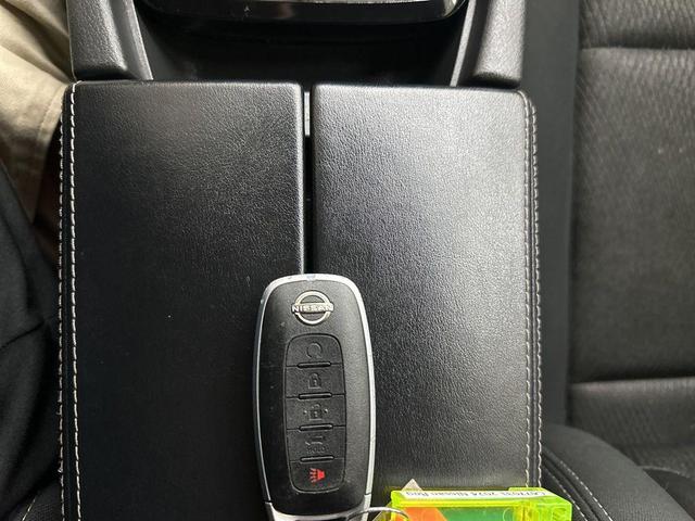 Photo of 2024 Scarlet Ember Tintcoat Nissan Rogue