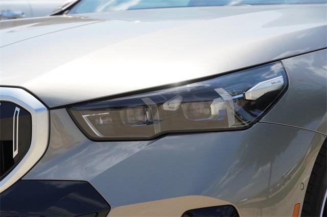 Photo of 2025 Oxide Grey Metallic BMW 530