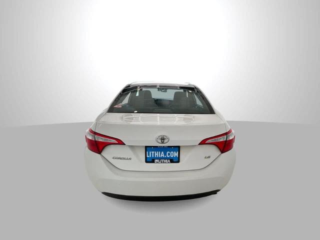 Photo of 2014 Super White Toyota Corolla