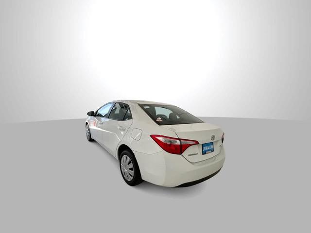 Photo of 2014 Super White Toyota Corolla