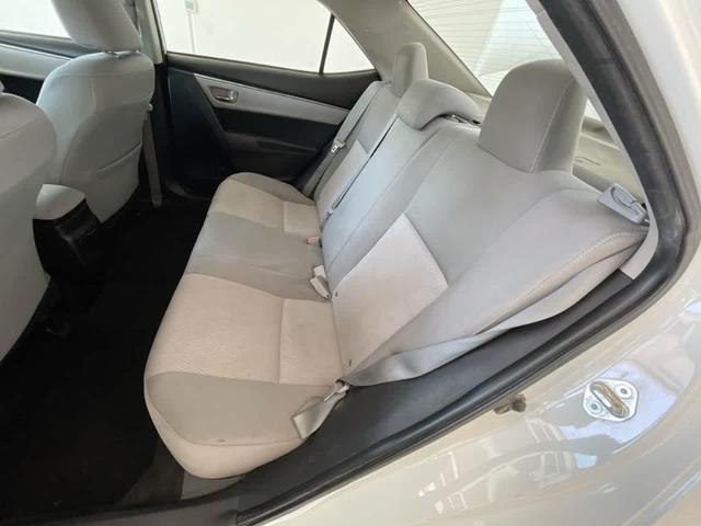 Photo of 2014 Super White Toyota Corolla