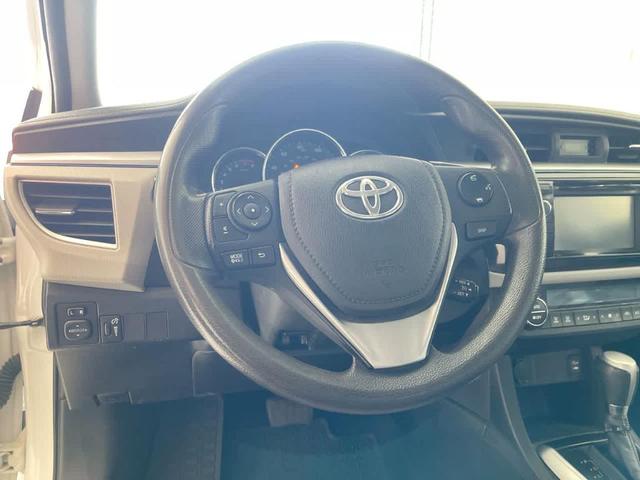 Photo of 2014 Super White Toyota Corolla