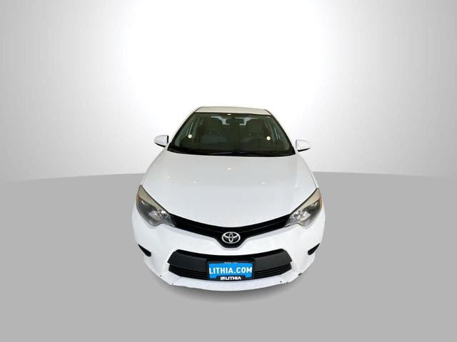 Photo of 2014 Super White Toyota Corolla