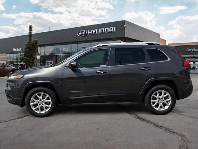 Photo of 2014 Granite Crystal Clearcoat Metallic Jeep Cherokee
