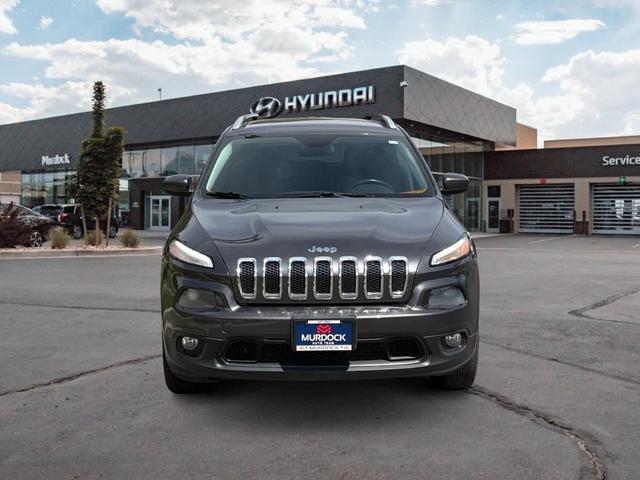 Photo of 2014 Granite Crystal Clearcoat Metallic Jeep Cherokee