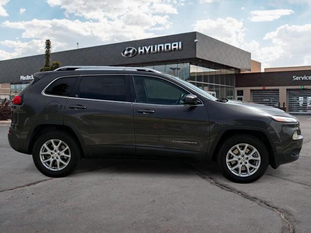 Photo of 2014 Granite Crystal Clearcoat Metallic Jeep Cherokee