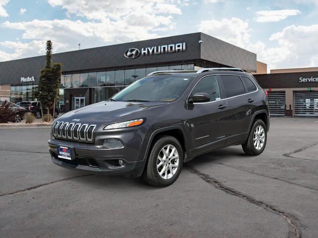 Photo of 2014 Granite Crystal Clearcoat Metallic Jeep Cherokee