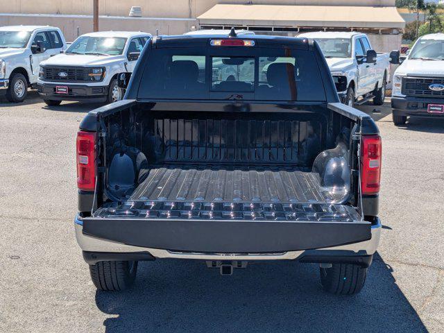 Photo of 2025 Diamond Black Crystal Pearlcoat RAM 1500