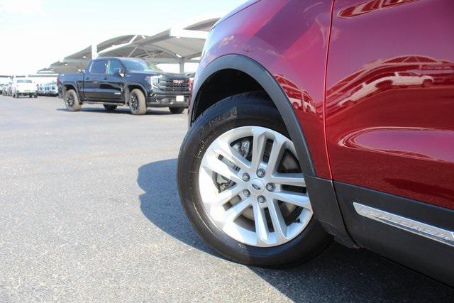Photo of 2016 Ruby Red Metallic Ford Explorer