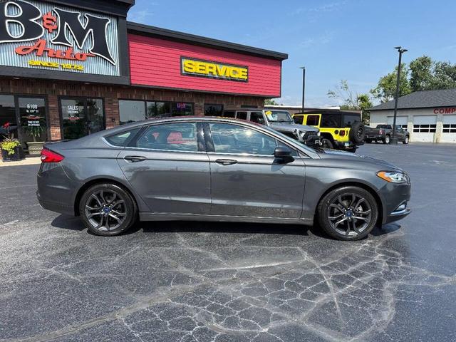 Photo of 2018 Magnetic Metallic Ford Fusion