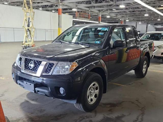 Photo of 2019 Magnetic Black Pearl Nissan Frontier