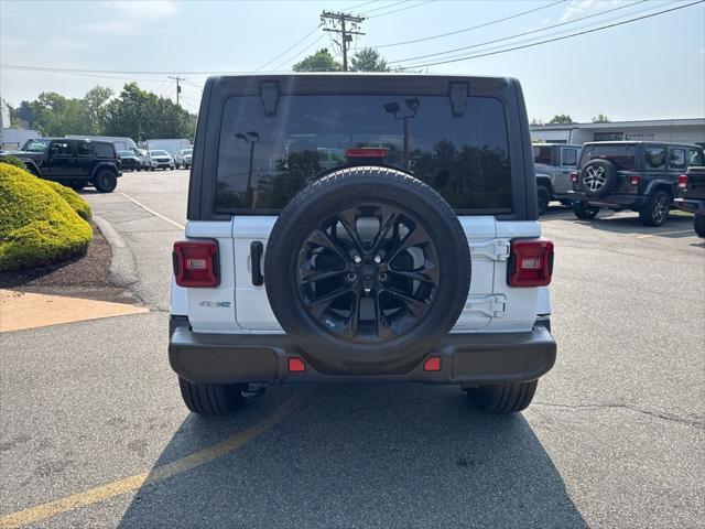 Photo of 2021 Bright White Clearcoat Jeep Wrangler Unlimited 4xe