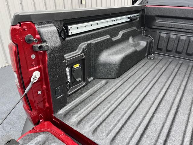 Photo of 2025 Ruby Red Metallic Tinted Clearcoat Ford Maverick