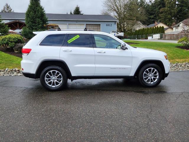 Photo of 2014 White Jeep Grand Cherokee