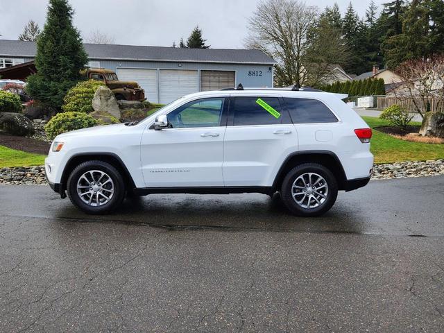 Photo of 2014 White Jeep Grand Cherokee