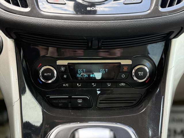 Photo of 2014 Turquoise Ford C-Max Hybrid