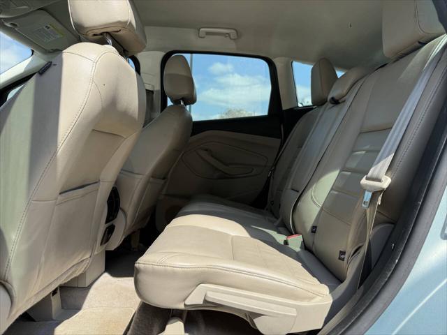 Photo of 2014 Turquoise Ford C-Max Hybrid
