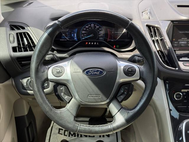 Photo of 2014 Turquoise Ford C-Max Hybrid