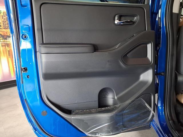 Photo of 2026 Bluestone Pearl Nissan Frontier